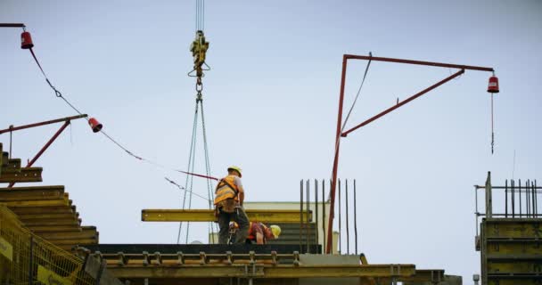 WARSAW, POLAND - MAY 24, 2019. Construction worker holds formwork beam — Stock Video