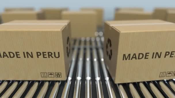 Boxes with MADE IN PERU text on roller conveyor. Peruvian goods related loopable 3D animation — Stock Video