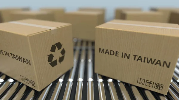 Cajas con texto MADE IN TAIWAN en transportador de rodillos. Productos taiwaneses relacionados con la representación 3D —  Fotos de Stock