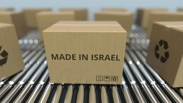 Caixas com texto MADE IN ISRAEL em transportador de rolos. Israel bens relacionados 3D renderização — Fotografia de Stock