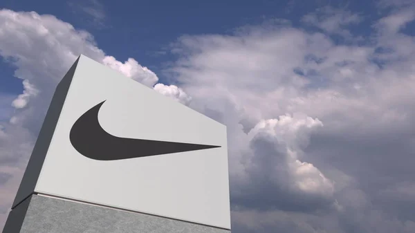 Nike logo tegen hemel achtergrond, redactionele 3D rendering — Stockfoto