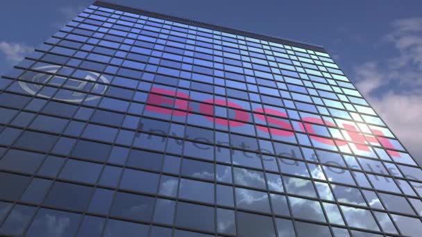 Bosch логотип на сучасному будівництві дзеркальне відображення неба і хмар, редакційна анімація — стокове відео