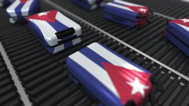 Many travel suitcases featuring flag of Cuba. Cuban tourism conceptual animation — Stock Video