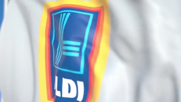 Bandera ondeante con logo Aldi, primer plano. Animación en 3D loopable editorial — Vídeos de Stock