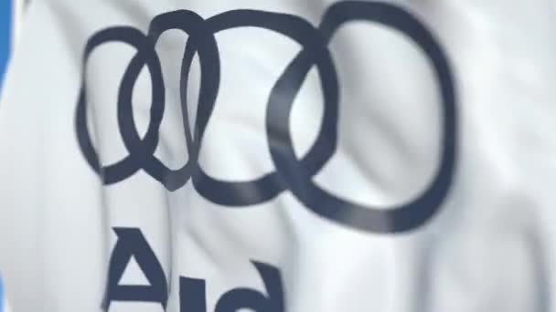 Bandiera sventolante con logo Audi, primo piano. Animazione 3D loop editoriale — Video Stock