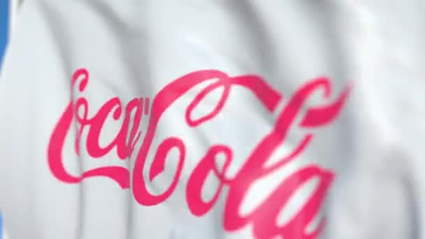 Waving flag med Coca-Cola Company logo, close-up. Redaktionel loopable 3D animation – Stock-video