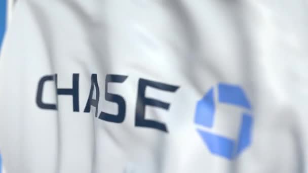 Acenando bandeira com o logotipo do Chase Bank, close-up. Editorial loopable animação 3D — Vídeo de Stock