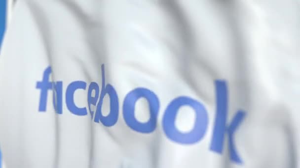 Bandiera sventolante con logo Facebook, Inc. primo piano. Animazione 3D loop editoriale — Video Stock