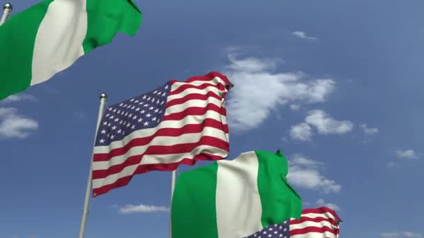 Flaggor Nigeria och USA mot Blue Sky, loopable 3D animation — Stockvideo