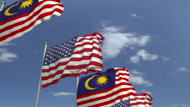 Bandeiras da Malásia e dos EUA contra o céu azul, animação 3D loopable — Vídeo de Stock