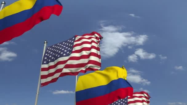 Vlaggen van Colombia en de VS tegen Blue Sky, loop bare 3D-animatie — Stockvideo