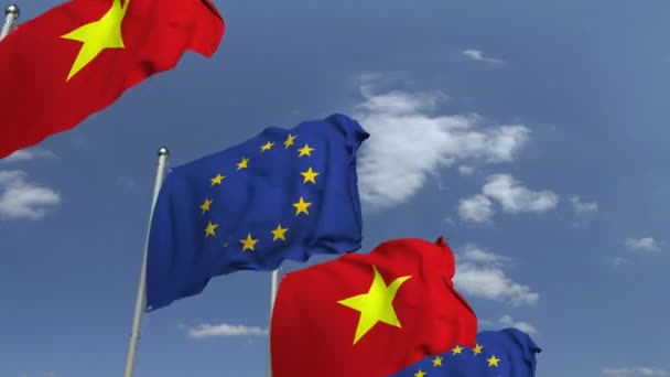 Flags of Vietnam and the European Union at international meeting, loopable 3D animation — Stock Video
