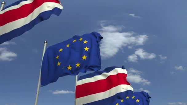 Drapeaux agitant du Costa Rica et de l'UE sur fond de ciel, animation 3D bouclable — Video