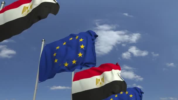 Egyptens flaggor och Europeiska unionen mot Blue Sky, loopable 3D animation — Stockvideo