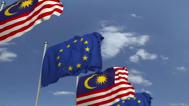 Flaggen von Malaysia und der Europäischen Union vor blauem Himmel, 3D-Animation — Stockvideo
