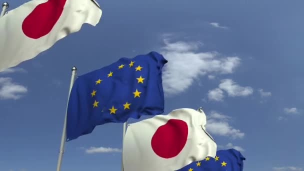 Mnohé vlajky Japonska a Evropské unie EU, smykatelná 3D animace — Stock video