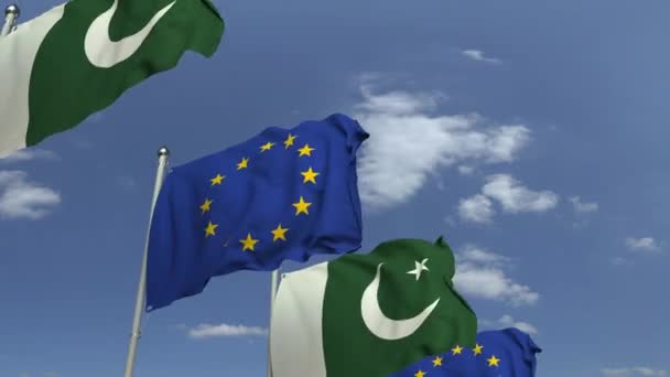 Acenando bandeiras do Paquistão e da União Europeia EU, loopable 3D animation — Vídeo de Stock