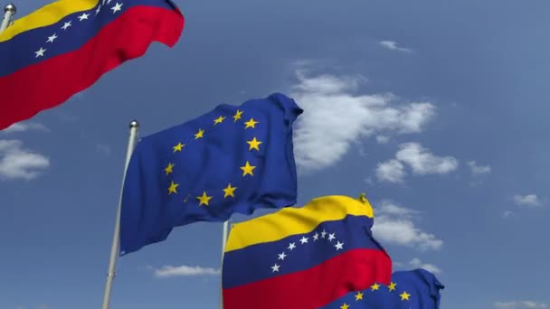 Banderas ondeantes de Venezuela y la UE en el fondo del cielo, animación 3D loopable — Vídeos de Stock