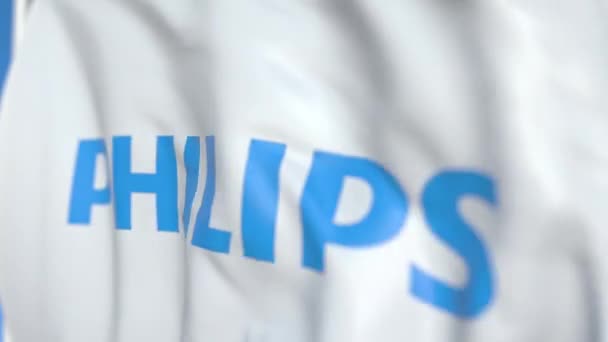 Falowanie flagi z logo firmy Koninklijke Philips N.V., zbliżenie. Redakcyjnej pętli animacji 3D — Wideo stockowe