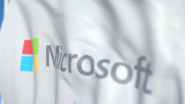 Viftande flagga med Microsoft Corporation logotyp, närbild. Redaktionell loopable 3D-animering — Stockvideo