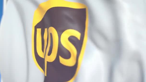 United Parcel Service, Inc. Ups logosu ile bayrak sallamak, yakın çekim. Editoryal döngülü 3d animasyon — Stok video