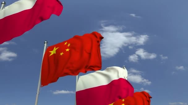 Zwaaiende vlaggen van Polen en China, loop bare 3D-animatie — Stockvideo