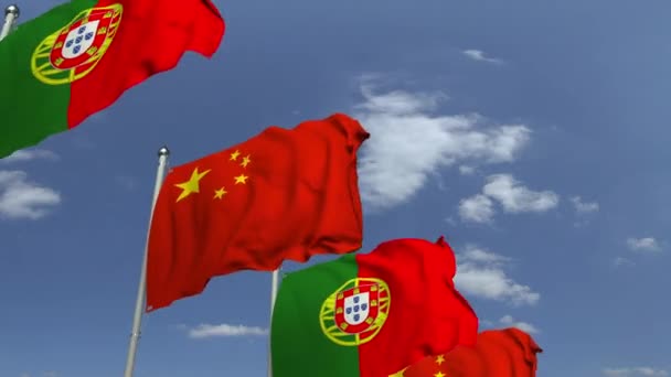 Многие флаги Португалии и Китая, петляющая 3D анимация — стоковое видео