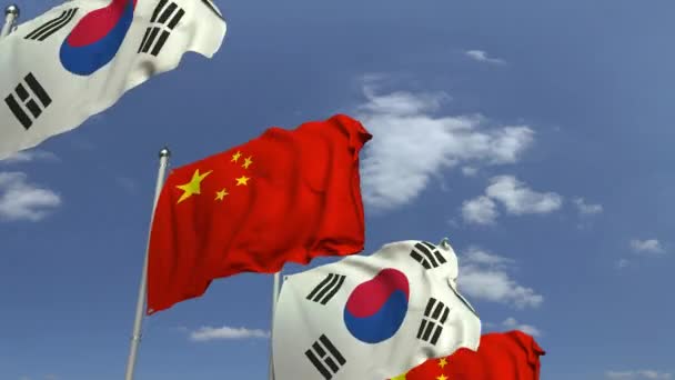 Wiele flag Korei Południowej i Chin, pętla animacji 3D — Wideo stockowe