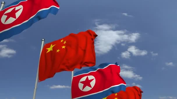 Wave flags of North Korea and China, loopable 3D animation — Stok Video
