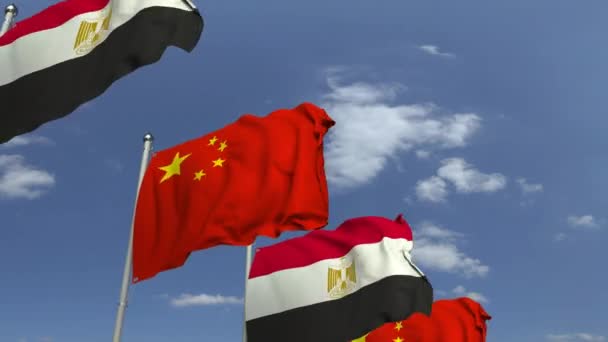 Banderas de Egipto y China contra el cielo azul, animación 3D loopable — Vídeo de stock