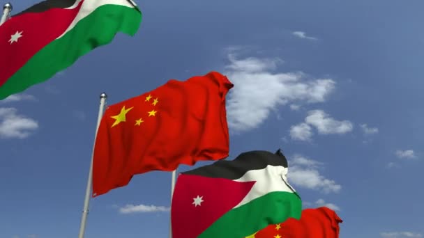 空の背景にヨルダンと中国の旗を振る、ループ可能な3Dアニメーション — ストック動画