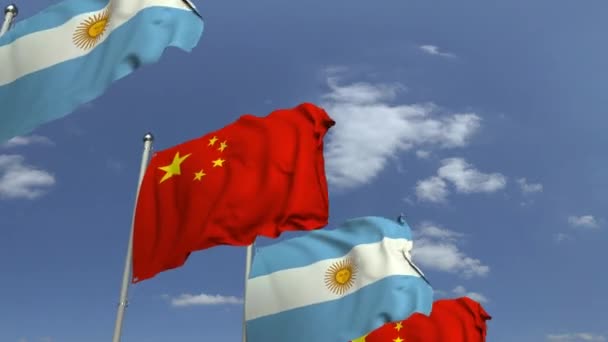 Fila de bandeiras acenando da Argentina e da China, animação 3D loopable — Vídeo de Stock