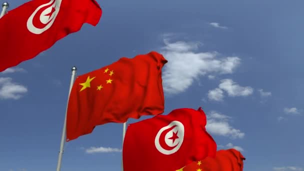Vele vlaggen van Tunesië en China, loop bare 3D-animatie — Stockvideo