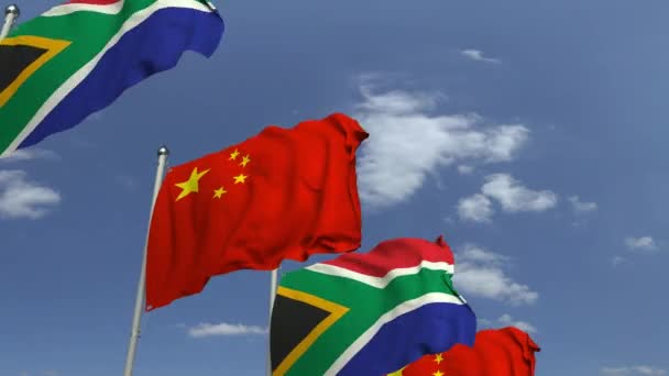 Sor integető zászlók a Dél-afrikai és kínai, loopable 3D animáció — Stock videók