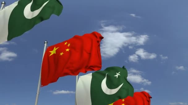 Mávající vlajky Pákistánu a Číny, smyklihodné 3D animace — Stock video