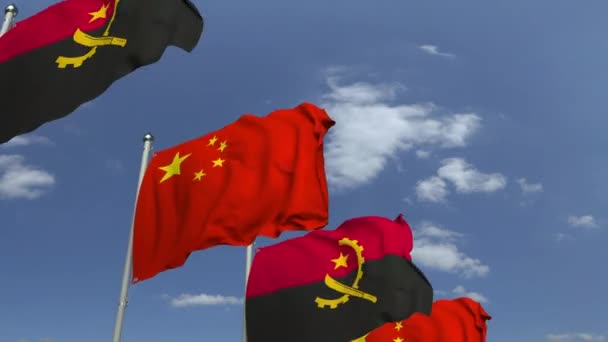Viftande flaggor Angola och Kina, loopable 3D animation — Stockvideo