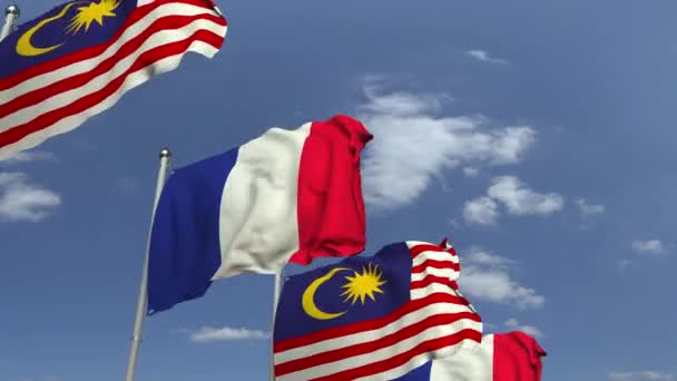 Drapeaux de Malaisie et de France contre le ciel bleu, animation 3D en boucle — Video