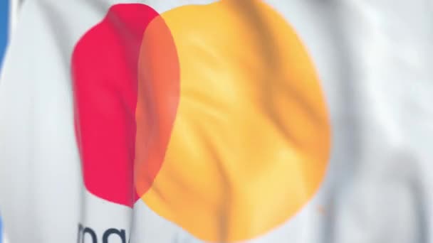 Flagge schwenkend mit eingearbeitetem Mastercard-Logo, Nahaufnahme. redaktionelle loopable 3D-Animation — Stockvideo