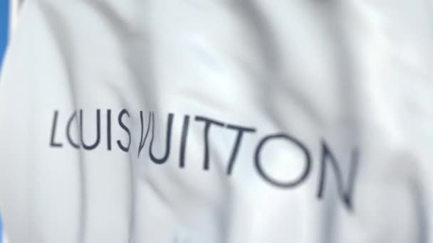 Viftande flagga med Louis Vuitton logo, närbild. Redaktionell loopable 3D-animering — Stockvideo