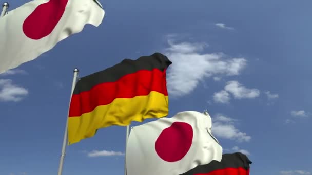 Muchas banderas de Japón y Alemania, animación 3D loopable — Vídeos de Stock