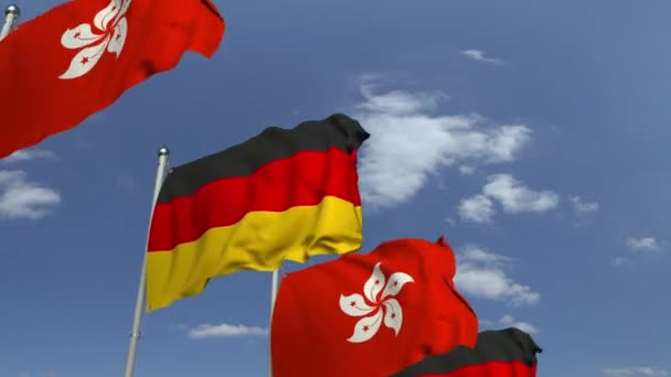 Fila de bandeiras acenando de Hong Kong e Alemanha, animação 3D loopable — Vídeo de Stock