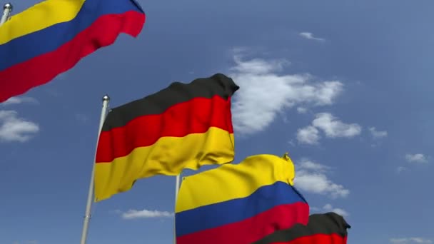 Vlag van Colombia en Duitsland tegen Blue Sky, loop bare 3D-animatie — Stockvideo