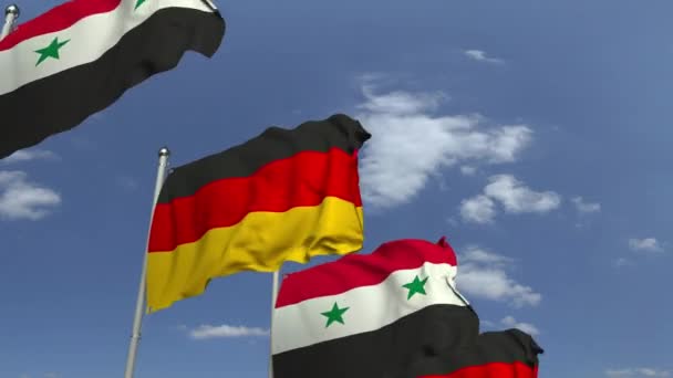 Banderas de Siria y Alemania contra el cielo azul, animación 3D loopable — Vídeo de stock