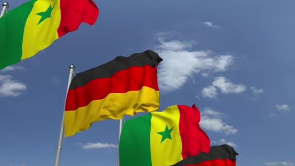 Πολλές σημαίες της Σενεγάλη και της Γερμανίας, loopable 3D κινούμενα σχέδια — Αρχείο Βίντεο