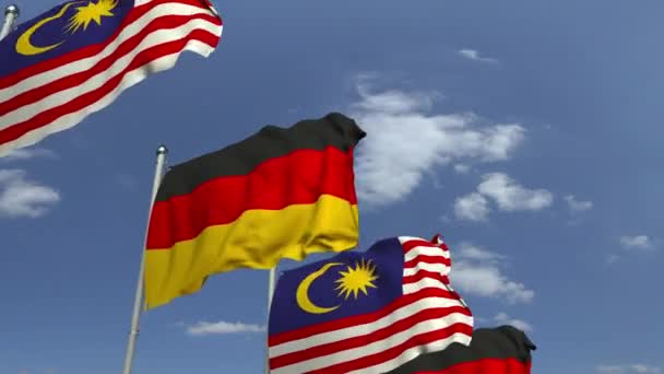 Banderas de Malasia y Alemania contra el cielo azul, animación 3D loopable — Vídeos de Stock