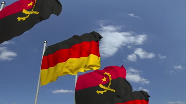 Zwaaiende vlaggen van Angola en Duitsland, loop bare 3D-animatie — Stockvideo