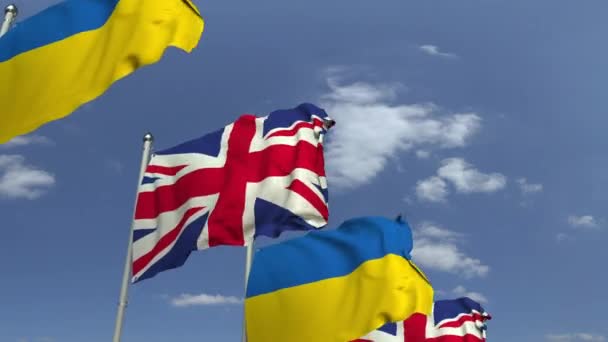 Flaggor i Ukraina och Storbritannien på internationella möte, loopable 3D animation — Stockvideo