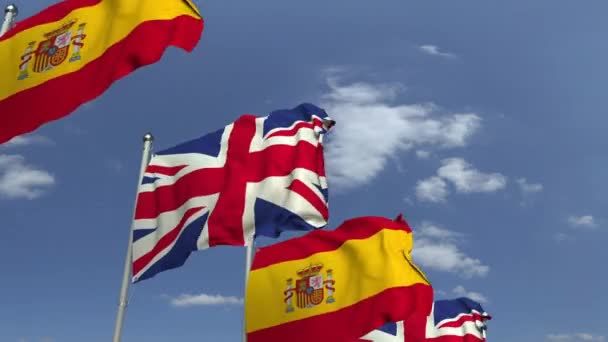 Muchas banderas de España y el Reino Unido, animación 3D loopable — Vídeo de stock