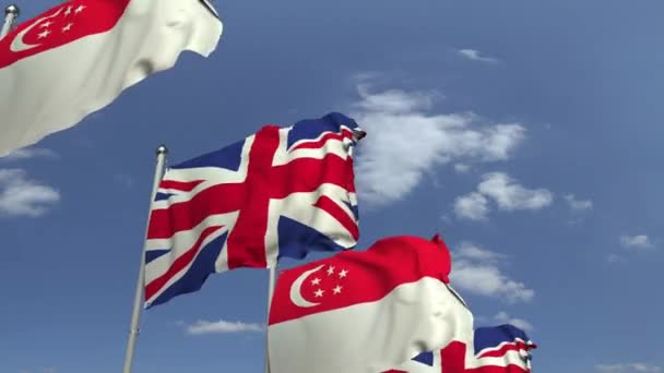 Bandiere sventolanti di Singapore e del Regno Unito, animazione 3D a scomparsa — Video Stock