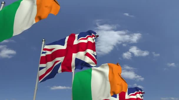 Bandiere dell'Irlanda e del Regno Unito in occasione di un incontro internazionale, animazione 3D — Video Stock